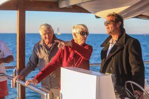 Sundowner Cruises Airlie Beach afternoon-cruise-chatting-to-skipper